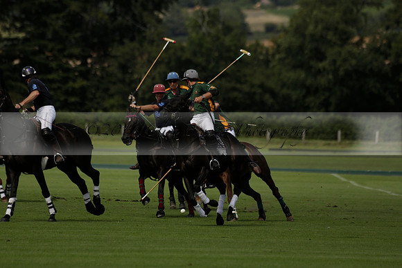 Maiz Dulce (green) v River (blue) in a Uber Polo Midsummer 12 goal polo match on Wednesday 21 August 2013 at Cowdray park Polo Club on Ambersham 2.  www.polopictures.co.uk
