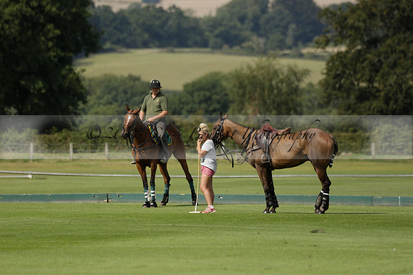 Maiz Dulce (green) v River (blue) in a Uber Polo Midsummer 12 goal polo match on Wednesday 21 August 2013 at Cowdray park Polo Club on Ambersham 2.  www.polopictures.co.uk