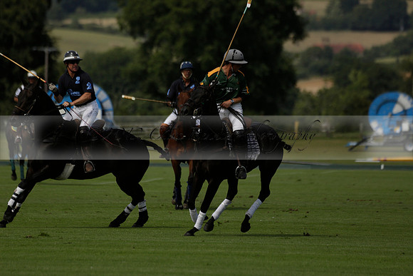 Maiz Dulce (green) v River (blue) in a Uber Polo Midsummer 12 goal polo match on Wednesday 21 August 2013 at Cowdray park Polo Club on Ambersham 2.  www.polopictures.co.uk