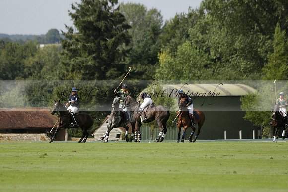 Maiz Dulce (green) v River (blue) in a Uber Polo Midsummer 12 goal polo match on Wednesday 21 August 2013 at Cowdray park Polo Club on Ambersham 2.  www.polopictures.co.uk