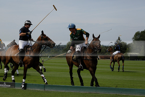 Maiz Dulce (green) v River (blue) in a Uber Polo Midsummer 12 goal polo match on Wednesday 21 August 2013 at Cowdray park Polo Club on Ambersham 2.  www.polopictures.co.uk