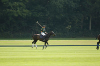 La Tremenda (mauve) v Maiz Dulce (green) in the Brecknock Cup  final polo match. Played at Cowdray Park Polo Club on Sunday 25 August 2013 on Ambersham 1. www.polopictures.co.uk