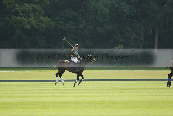 La Tremenda (mauve) v Maiz Dulce (green) in the Brecknock Cup  final polo match. Played at Cowdray Park Polo Club on Sunday 25 August 2013 on Ambersham 1. www.polopictures.co.uk