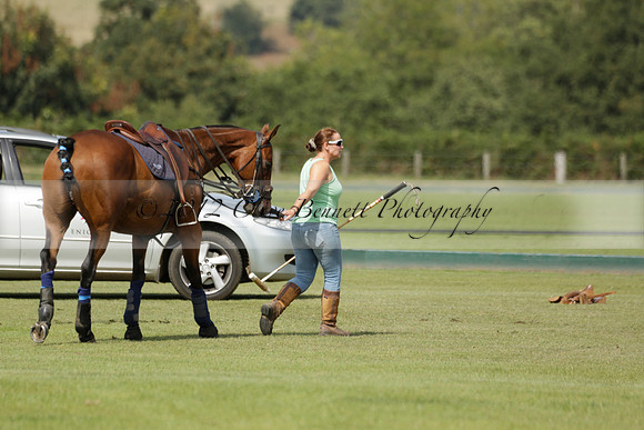 Maiz Dulce (green) v River (blue) in a Uber Polo Midsummer 12 goal polo match on Wednesday 21 August 2013 at Cowdray park Polo Club on Ambersham 2.  www.polopictures.co.uk