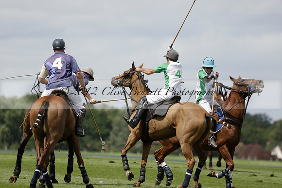 Burningfold (blue) v Wairakei Pastoral (green) in the Ruins Cup Final on Sunday 04 August 2013.