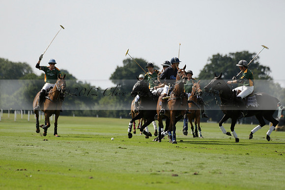 Maiz Dulce (green) v River (blue) in a Uber Polo Midsummer 12 goal polo match on Wednesday 21 August 2013 at Cowdray park Polo Club on Ambersham 2.  www.polopictures.co.uk