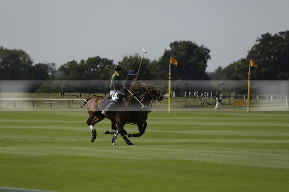 Maiz Dulce (green) v River (blue) in a Uber Polo Midsummer 12 goal polo match on Wednesday 21 August 2013 at Cowdray park Polo Club on Ambersham 2.  www.polopictures.co.uk