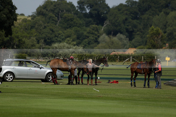 Maiz Dulce (green) v River (blue) in a Uber Polo Midsummer 12 goal polo match on Wednesday 21 August 2013 at Cowdray park Polo Club on Ambersham 2.  www.polopictures.co.uk