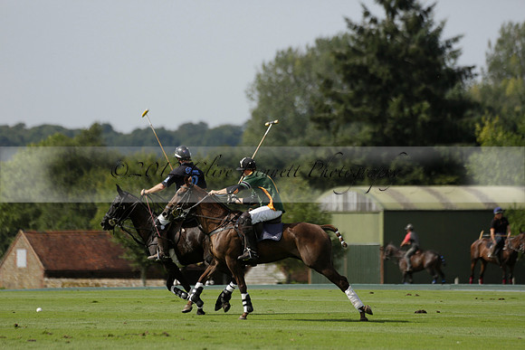 Maiz Dulce (green) v River (blue) in a Uber Polo Midsummer 12 goal polo match on Wednesday 21 August 2013 at Cowdray park Polo Club on Ambersham 2.  www.polopictures.co.uk