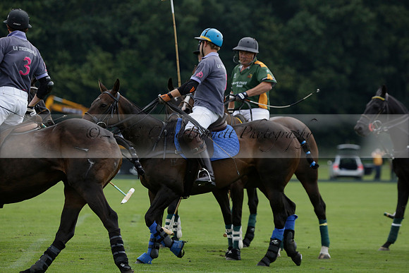 La Tremenda (mauve) v Maiz Dulce (green) in the Brecknock Cup  final polo match. Played at Cowdray Park Polo Club on Sunday 25 August 2013 on Ambersham 1. www.polopictures.co.uk