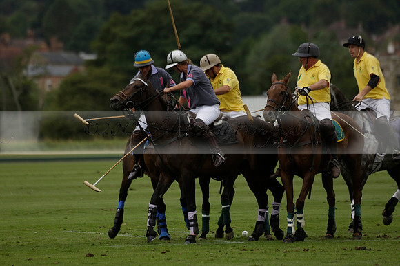 La Tremenda (lilac) v Maiz Dulce (yellow) in a Brecknock Cup polo match played on Lawns 1 at the Cowdray Park Polo Club on Tuesday 13 August 2013