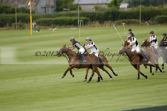 Beau Design v Boscom in an August Rother Cup 4 goal polo match at Cowdray Park Polo Club on Wednesday 07 August 2013