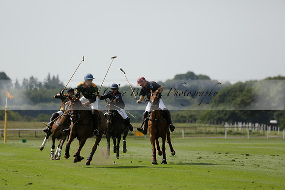 Maiz Dulce (green) v River (blue) in a Uber Polo Midsummer 12 goal polo match on Wednesday 21 August 2013 at Cowdray park Polo Club on Ambersham 2.  www.polopictures.co.uk