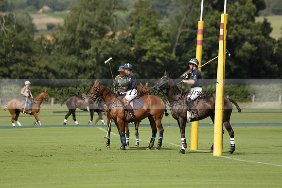 Maiz Dulce (green) v River (blue) in a Uber Polo Midsummer 12 goal polo match on Wednesday 21 August 2013 at Cowdray park Polo Club on Ambersham 2.  www.polopictures.co.uk