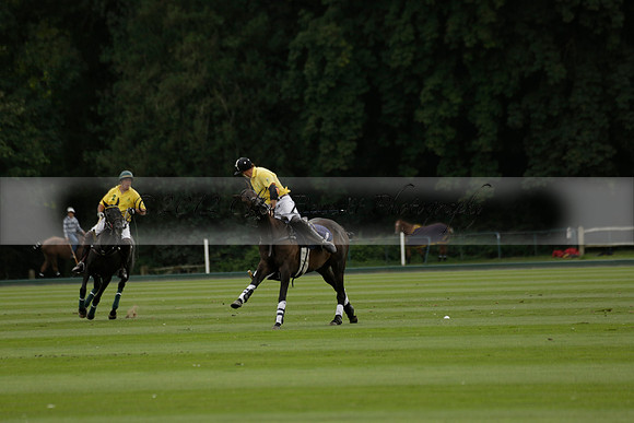 La Tremenda (lilac) v Maiz Dulce (yellow) in a Brecknock Cup polo match played on Lawns 1 at the Cowdray Park Polo Club on Tuesday 13 August 2013