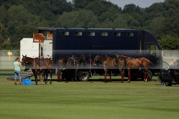 Maiz Dulce (green) v River (blue) in a Uber Polo Midsummer 12 goal polo match on Wednesday 21 August 2013 at Cowdray park Polo Club on Ambersham 2.  www.polopictures.co.uk