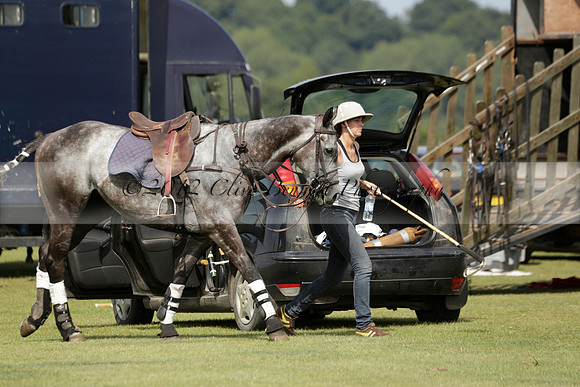 Maiz Dulce (green) v River (blue) in a Uber Polo Midsummer 12 goal polo match on Wednesday 21 August 2013 at Cowdray park Polo Club on Ambersham 2.  www.polopictures.co.uk