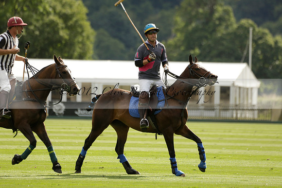 La Tremenda (lilac) v Maiz Dulce (yellow) in a Brecknock Cup polo match played on Lawns 1 at the Cowdray Park Polo Club on Tuesday 13 August 2013