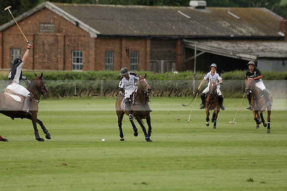 Beau Design v Boscom in an August Rother Cup 4 goal polo match at Cowdray Park Polo Club on Wednesday 07 August 2013