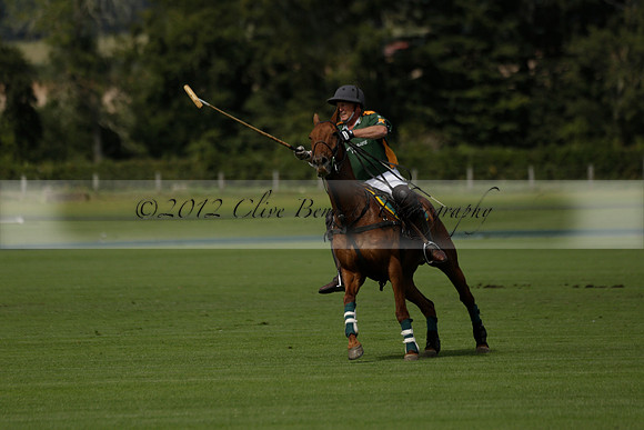 Maiz Dulce (green) v River (blue) in a Uber Polo Midsummer 12 goal polo match on Wednesday 21 August 2013 at Cowdray park Polo Club on Ambersham 2.  www.polopictures.co.uk