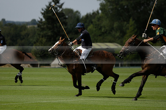 Maiz Dulce (green) v River (blue) in a Uber Polo Midsummer 12 goal polo match on Wednesday 21 August 2013 at Cowdray park Polo Club on Ambersham 2.  www.polopictures.co.uk