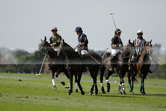 Maiz Dulce (green) v River (blue) in a Uber Polo Midsummer 12 goal polo match on Wednesday 21 August 2013 at Cowdray park Polo Club on Ambersham 2.  www.polopictures.co.uk