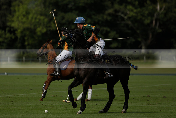 Maiz Dulce (green) v River (blue) in a Uber Polo Midsummer 12 goal polo match on Wednesday 21 August 2013 at Cowdray park Polo Club on Ambersham 2.  www.polopictures.co.uk