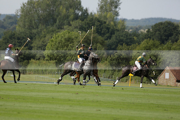 Maiz Dulce (green) v River (blue) in a Uber Polo Midsummer 12 goal polo match on Wednesday 21 August 2013 at Cowdray park Polo Club on Ambersham 2.  www.polopictures.co.uk