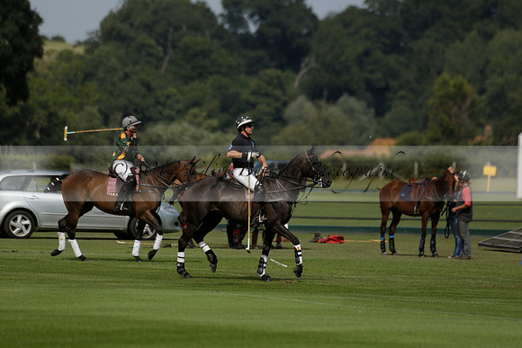 Maiz Dulce (green) v River (blue) in a Uber Polo Midsummer 12 goal polo match on Wednesday 21 August 2013 at Cowdray park Polo Club on Ambersham 2.  www.polopictures.co.uk