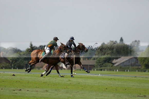 Maiz Dulce (green) v River (blue) in a Uber Polo Midsummer 12 goal polo match on Wednesday 21 August 2013 at Cowdray park Polo Club on Ambersham 2.  www.polopictures.co.uk