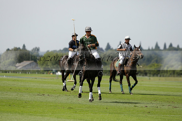 Maiz Dulce (green) v River (blue) in a Uber Polo Midsummer 12 goal polo match on Wednesday 21 August 2013 at Cowdray park Polo Club on Ambersham 2.  www.polopictures.co.uk
