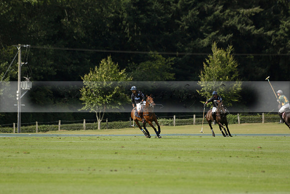 Maiz Dulce (green) v River (blue) in a Uber Polo Midsummer 12 goal polo match on Wednesday 21 August 2013 at Cowdray park Polo Club on Ambersham 2.  www.polopictures.co.uk