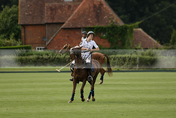 Beau Design v Boscom in an August Rother Cup 4 goal polo match at Cowdray Park Polo Club on Wednesday 07 August 2013