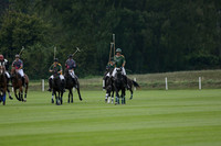 La Tremenda (mauve) v Maiz Dulce (green) in the Brecknock Cup  final polo match. Played at Cowdray Park Polo Club on Sunday 25 August 2013 on Ambersham 1. www.polopictures.co.uk