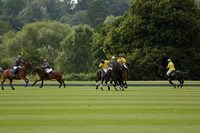 La Tremenda (lilac) v Maiz Dulce (yellow) in a Brecknock Cup polo match played on Lawns 1 at the Cowdray Park Polo Club on Tuesday 13 August 2013