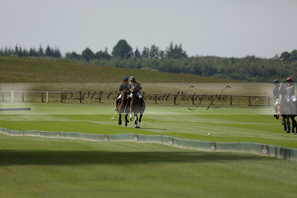 Maiz Dulce (green) v River (blue) in a Uber Polo Midsummer 12 goal polo match on Wednesday 21 August 2013 at Cowdray park Polo Club on Ambersham 2.  www.polopictures.co.uk
