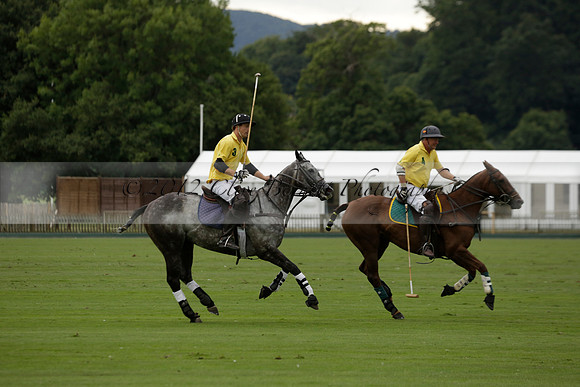 La Tremenda (lilac) v Maiz Dulce (yellow) in a Brecknock Cup polo match played on Lawns 1 at the Cowdray Park Polo Club on Tuesday 13 August 2013