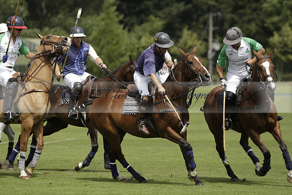 Burningfold (blue) v Wairakei Pastoral (green) in the Ruins Cup Final on Sunday 04 August 2013.