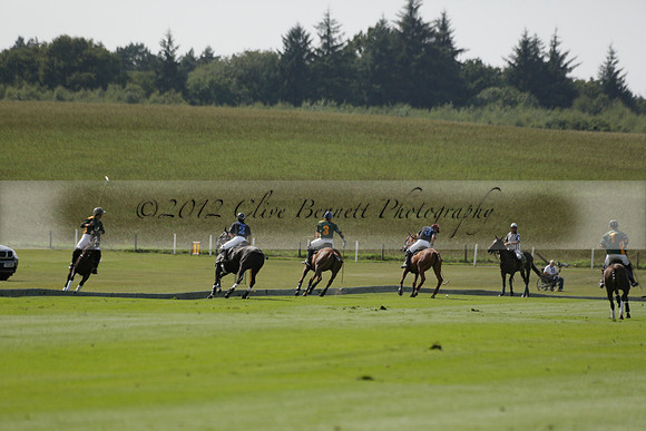 Maiz Dulce (green) v River (blue) in a Uber Polo Midsummer 12 goal polo match on Wednesday 21 August 2013 at Cowdray park Polo Club on Ambersham 2.  www.polopictures.co.uk