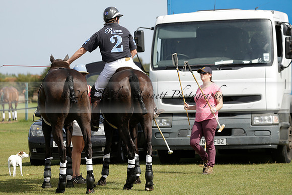 Maiz Dulce (green) v River (blue) in a Uber Polo Midsummer 12 goal polo match on Wednesday 21 August 2013 at Cowdray park Polo Club on Ambersham 2.  www.polopictures.co.uk