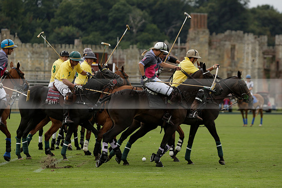 La Tremenda (lilac) v Maiz Dulce (yellow) in a Brecknock Cup polo match played on Lawns 1 at the Cowdray Park Polo Club on Tuesday 13 August 2013