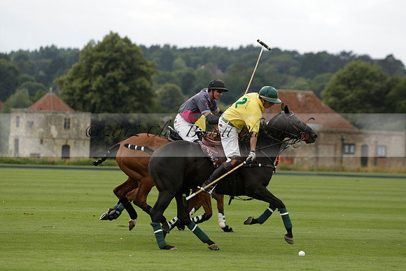 La Tremenda (lilac) v Maiz Dulce (yellow) in a Brecknock Cup polo match played on Lawns 1 at the Cowdray Park Polo Club on Tuesday 13 August 2013