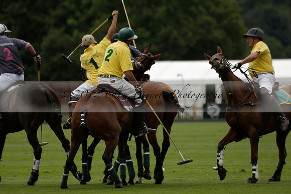La Tremenda (lilac) v Maiz Dulce (yellow) in a Brecknock Cup polo match played on Lawns 1 at the Cowdray Park Polo Club on Tuesday 13 August 2013