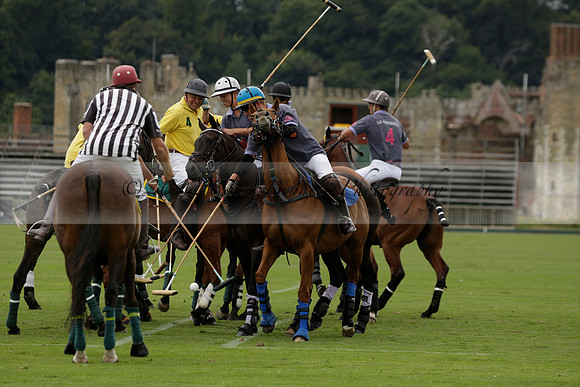 La Tremenda (lilac) v Maiz Dulce (yellow) in a Brecknock Cup polo match played on Lawns 1 at the Cowdray Park Polo Club on Tuesday 13 August 2013