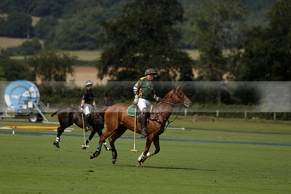 Maiz Dulce (green) v River (blue) in a Uber Polo Midsummer 12 goal polo match on Wednesday 21 August 2013 at Cowdray park Polo Club on Ambersham 2.  www.polopictures.co.uk