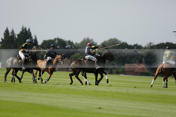 Maiz Dulce (green) v River (blue) in a Uber Polo Midsummer 12 goal polo match on Wednesday 21 August 2013 at Cowdray park Polo Club on Ambersham 2.  www.polopictures.co.uk