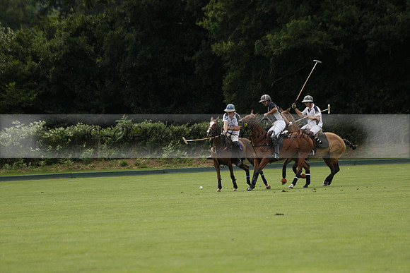Beau Design v Boscom in an August Rother Cup 4 goal polo match at Cowdray Park Polo Club on Wednesday 07 August 2013