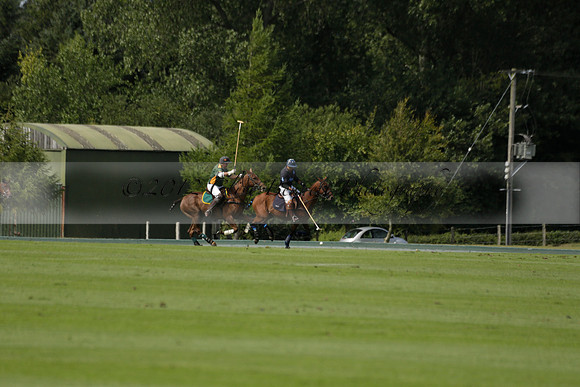 Maiz Dulce (green) v River (blue) in a Uber Polo Midsummer 12 goal polo match on Wednesday 21 August 2013 at Cowdray park Polo Club on Ambersham 2.  www.polopictures.co.uk