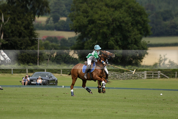 Burningfold (blue) v Wairakei Pastoral (green) in the Ruins Cup Final on Sunday 04 August 2013.