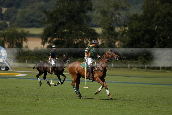 Maiz Dulce (green) v River (blue) in a Uber Polo Midsummer 12 goal polo match on Wednesday 21 August 2013 at Cowdray park Polo Club on Ambersham 2.  www.polopictures.co.uk